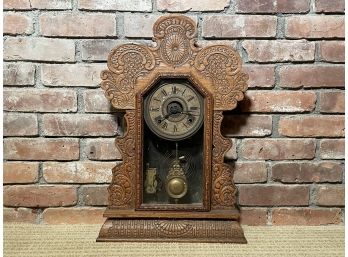 An Antique Carved Wood Mantle Clock