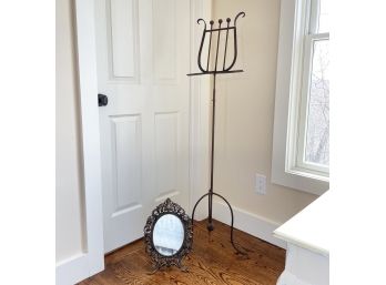 A Wrought Iron Music Stand And Filigree Mirror