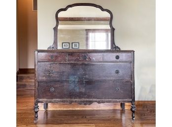 An Antique Veneered Wood Dresser With Mirror
