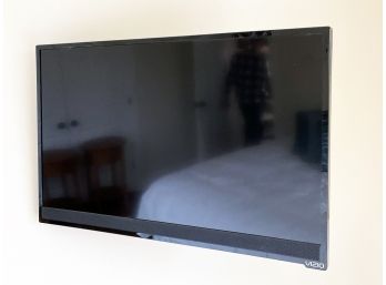 A Sony Vizio 22' Flat Screen TV, Mount, And BluRay Player
