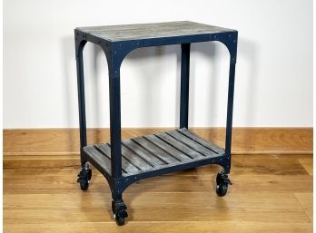 An Industrial Side Table Or Cart