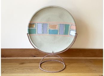 A Vintage Southwestern Glazed Ceramic Platter On Metal Stand