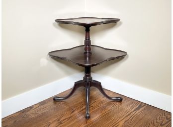 A Vintage Tiered Mahogany Table