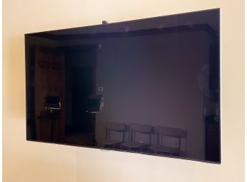 A Samsung 48' Flat Screen TV On Wall Mount