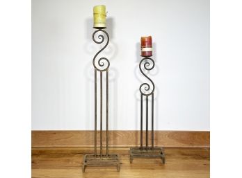 A Pair Of Large Wrought Iron Candle Holders