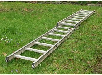 A 16' Aluminum Extension Ladder By Werner