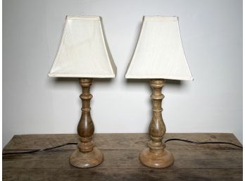 A Pair Of Turned Wood Stick Lamps