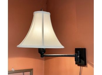 An Articulating Oil Rubbed Bronze Wall Sconce