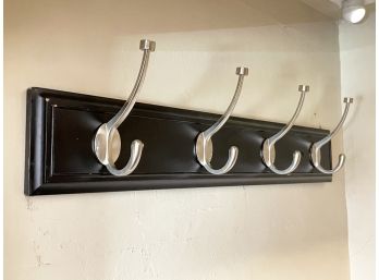 A Hook Unit With Brushed Steel Hardware