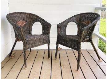 A Pair Of Vintage Wicker Arm Chairs