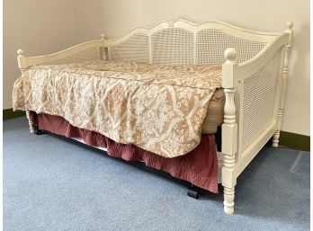 A Vintage Cane And Hardwood Trundle Bed