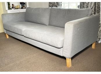 A Modern Sofa In Neutral Grey Linen