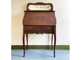 A 19th Century Oak Secretary Desk With Mirrored Back Panel