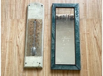 A Vintage Thermometer And Metal Framed Mirror