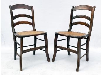 A Pair Of Vintage Cane Seated Ladder Back Side Chairs