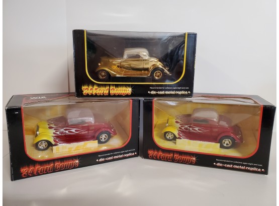 3 NIB 1934 Ford Coupe Die Cast Model Cars 2002