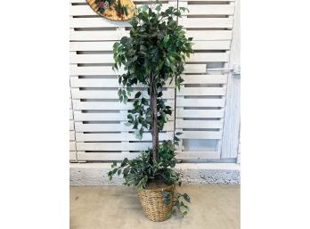 Seven Foot Artificial Tree In Rattan Basket With Lights