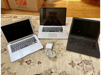 Three Older Apple MacBooks, Models A1286, A1466, A1181
