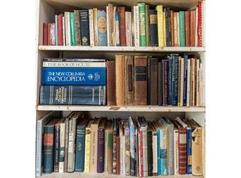 Three Shelves Of A Library Collection