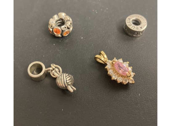 Group Of Charms 925 And A Pendent With A Pink Stone And Rhinestones(?)