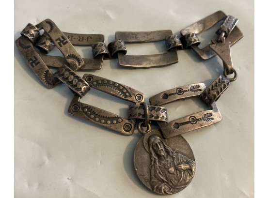 Vintage Bracelet With Arrow Carved In To The Links With A Charm Hanging.