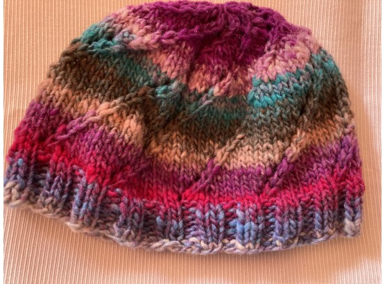 Hand Knitted Bright And Happy Hat With Pinks, Red, Green And Even Purple