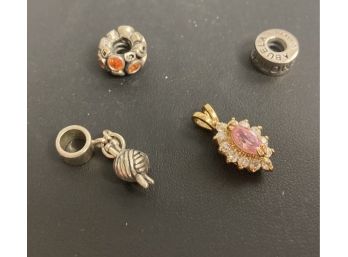 Group Of Charms 925 And A Pendent With A Pink Stone And Rhinestones(?)