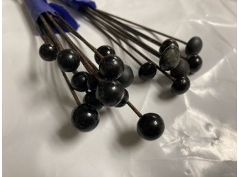 Group Of  Black Top Hat And Stick Pins