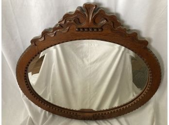 Pretty Oval Wood Mirror With Ornate Top