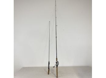 Pair Of Fishing Poles One With Daiwa Reel