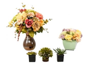 Collection Of Faux Flowers And Plants