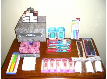 Lot Of Toiletries: Soap, Tissues, Tooth Brushes, Dental Picks, Combs, And More