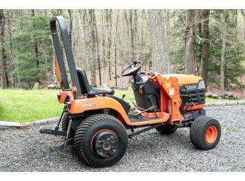 Kubota BX2200 Tractor With Plow, Mowing Deck, 3-Bag Grass Catcher, And Front Loader