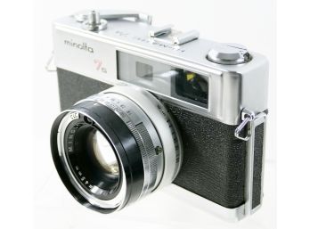 Vintage Minolta Hi-Matic 7s Camera With Brochure, Leather Case And 45mm Rokkor Lens