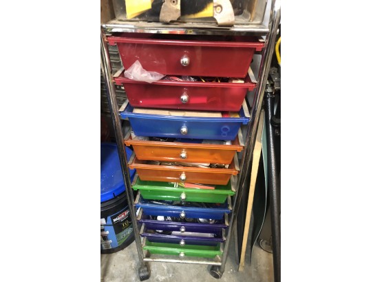 Rack Of Colorful Drawers Full Of Assorted Tools