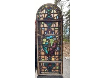 LARGE ANTIQUE  ARCHED STAINED GLASS WINDOW. EARLY 20TH CENTURY. EACH OF THESE WINDOWS WAS REMOVED FROM A LOCAL