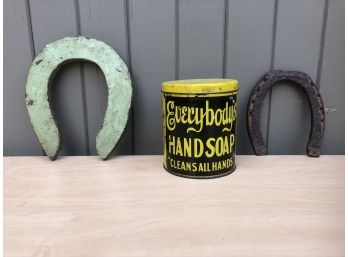 Advertising Can And Antique Horseshoes