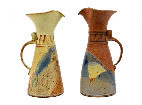 Pair Of Signed Pottery Pitchers