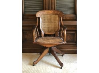 Rollling Spindle Desk Chair With Cane Back And Seat