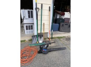 Group Of Yard Tools And Leaf Blower