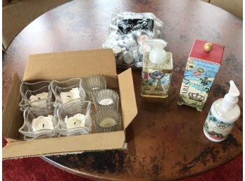 7 Votives In Box, 1 Bag Tealights, And New Bottle Of Michel Design Works Paris Hand Soap And Lotion Unused