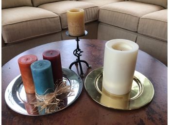 5 Pillar Candles, 2 Chargers And 1 Tall Wrought Iron Candle Stick