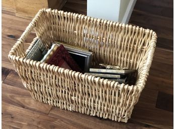 Wicker Basket Filled With A Collection 15 Picture Frames
