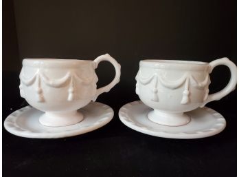 Two New World Bazaar White On White Ceramic Jumbo Cups & Saucers