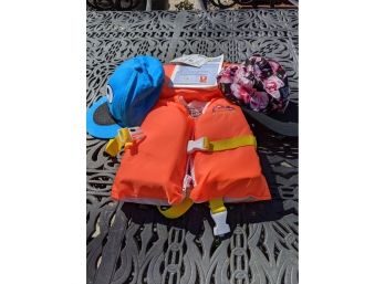A Brand New Life Jacket Plus Two Fun Hats - Including Cookie Monster From Sesame Street!