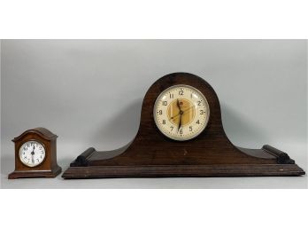 GENERAL ELECTRIC 'OVER THE HILL' MANTLE CLOCK AND A SETH THOMAS WALNUT ALARM CLOCK