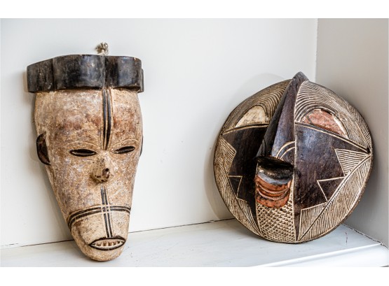 Two Primitive Carved Masks