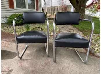 Two Black Vinyl And Chrome MCM Chairs