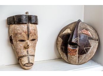 Two Primitive Carved Masks