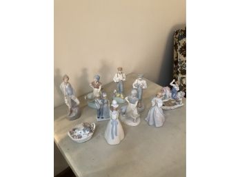 9 Figurines - Signed & Unsigned